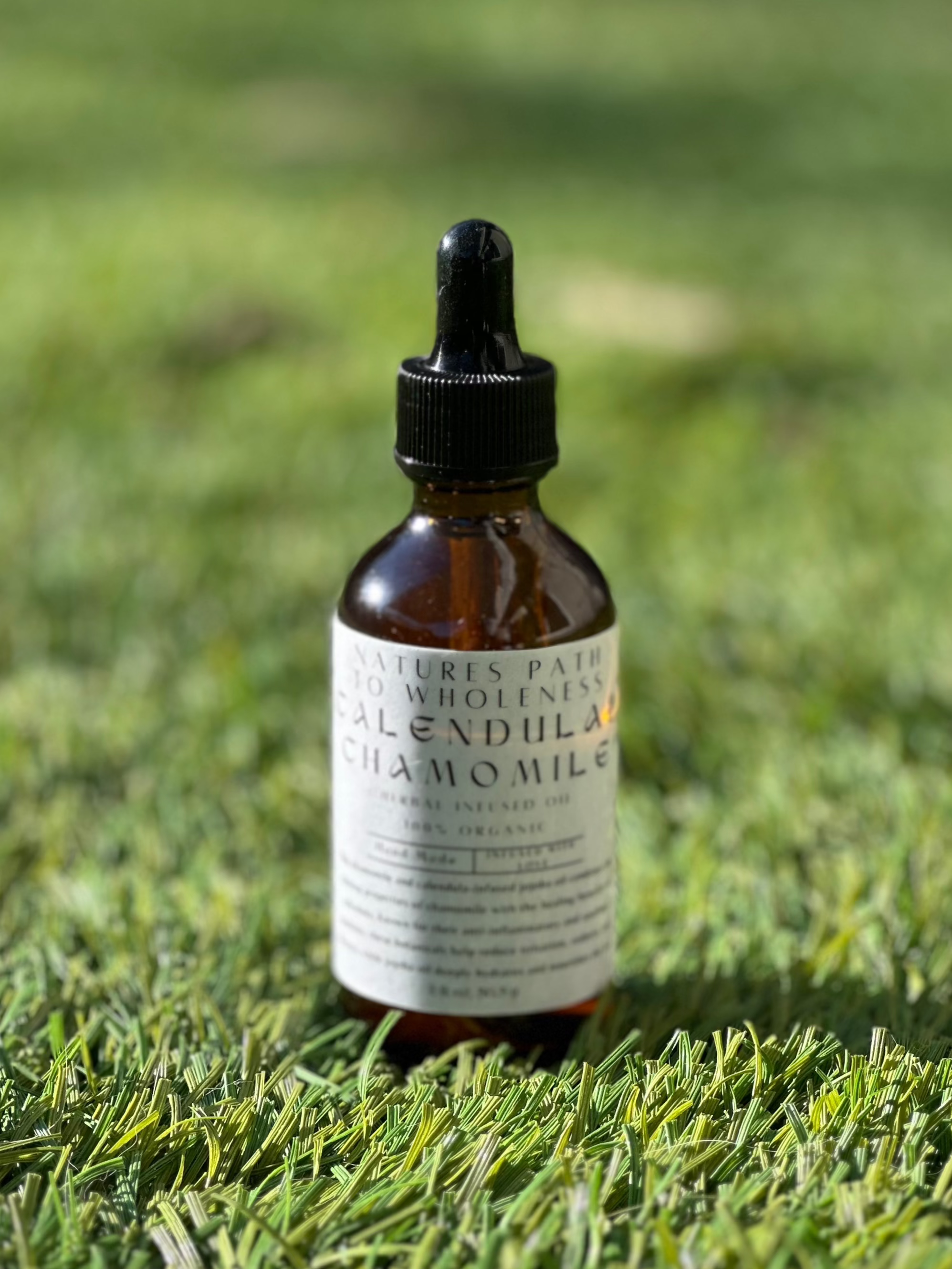 Calendula and chamomile herbal infused oil 2 oz amber bottle