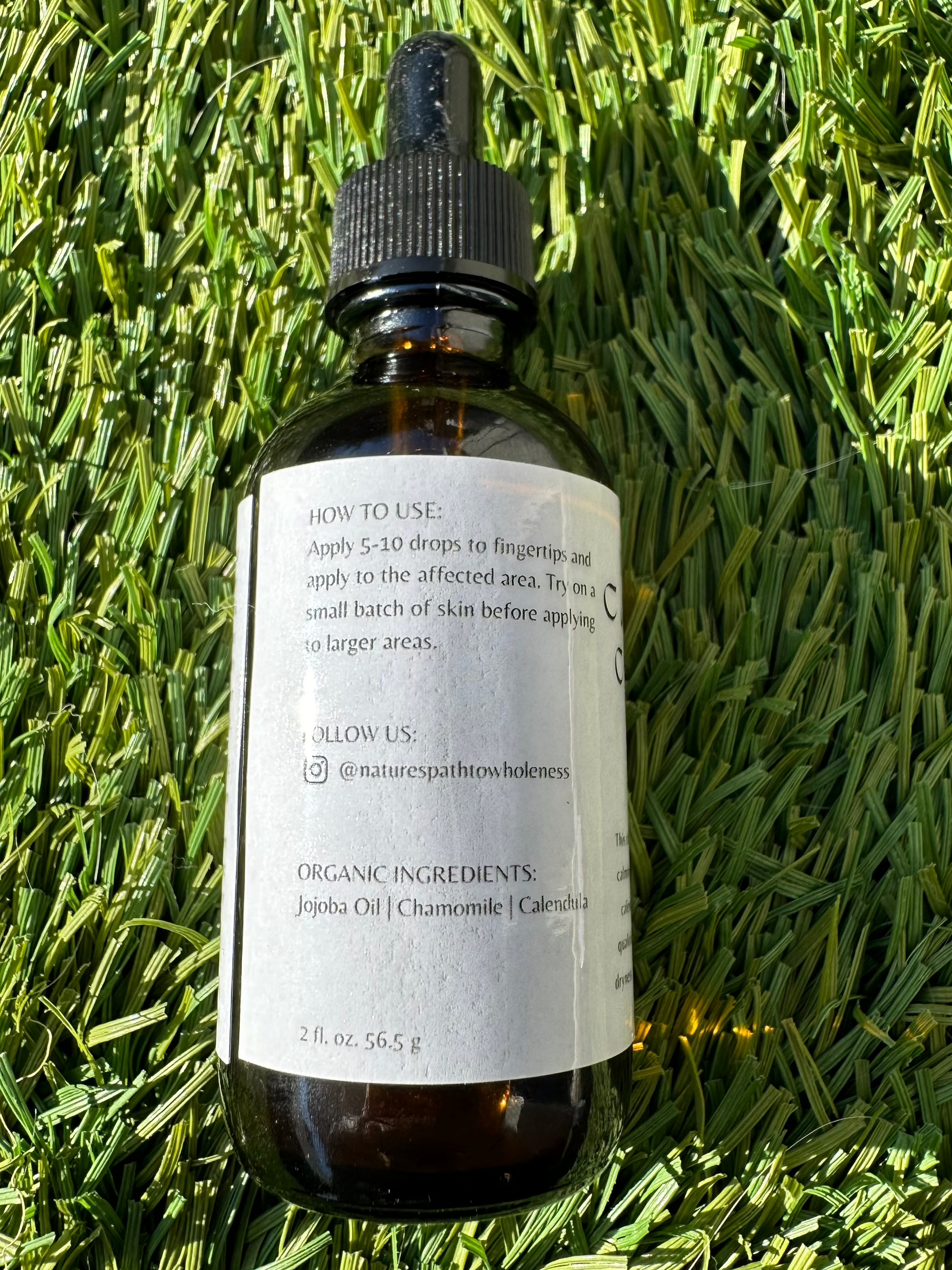 Calendula and chamomile herbal infused oil 2 oz amber bottle