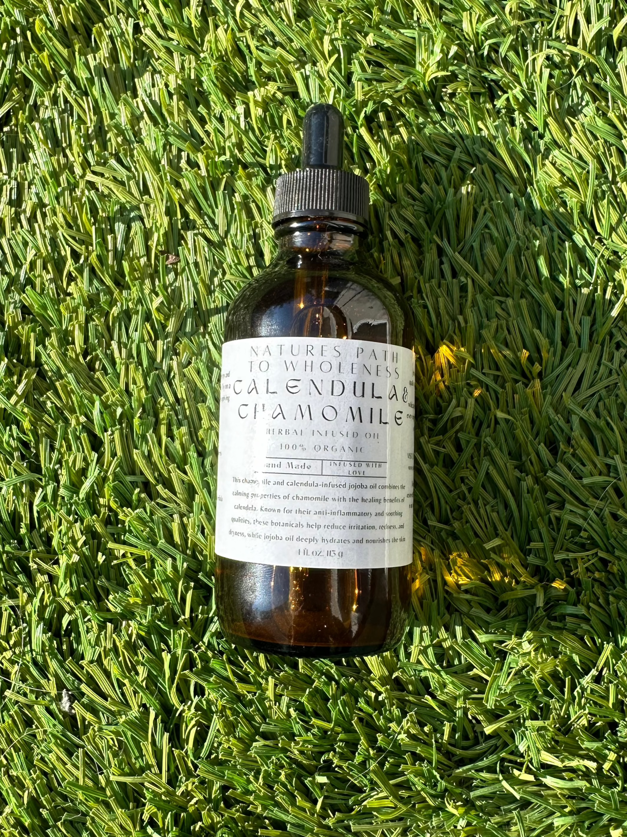 Calendula and chamomile herbal infused oil 4 oz amber bottle