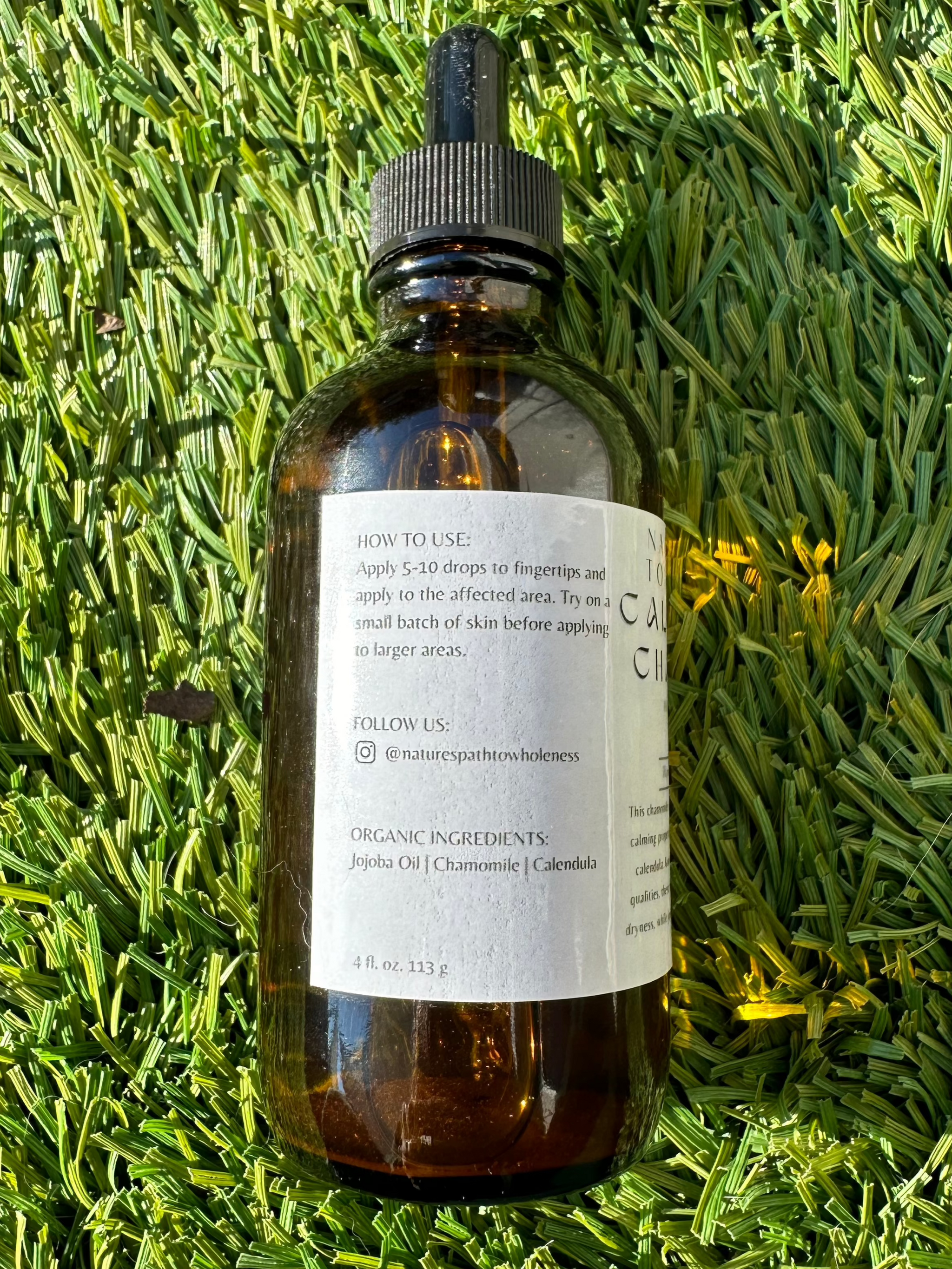 Calendula and chamomile herbal infused oil 4 oz amber bottle