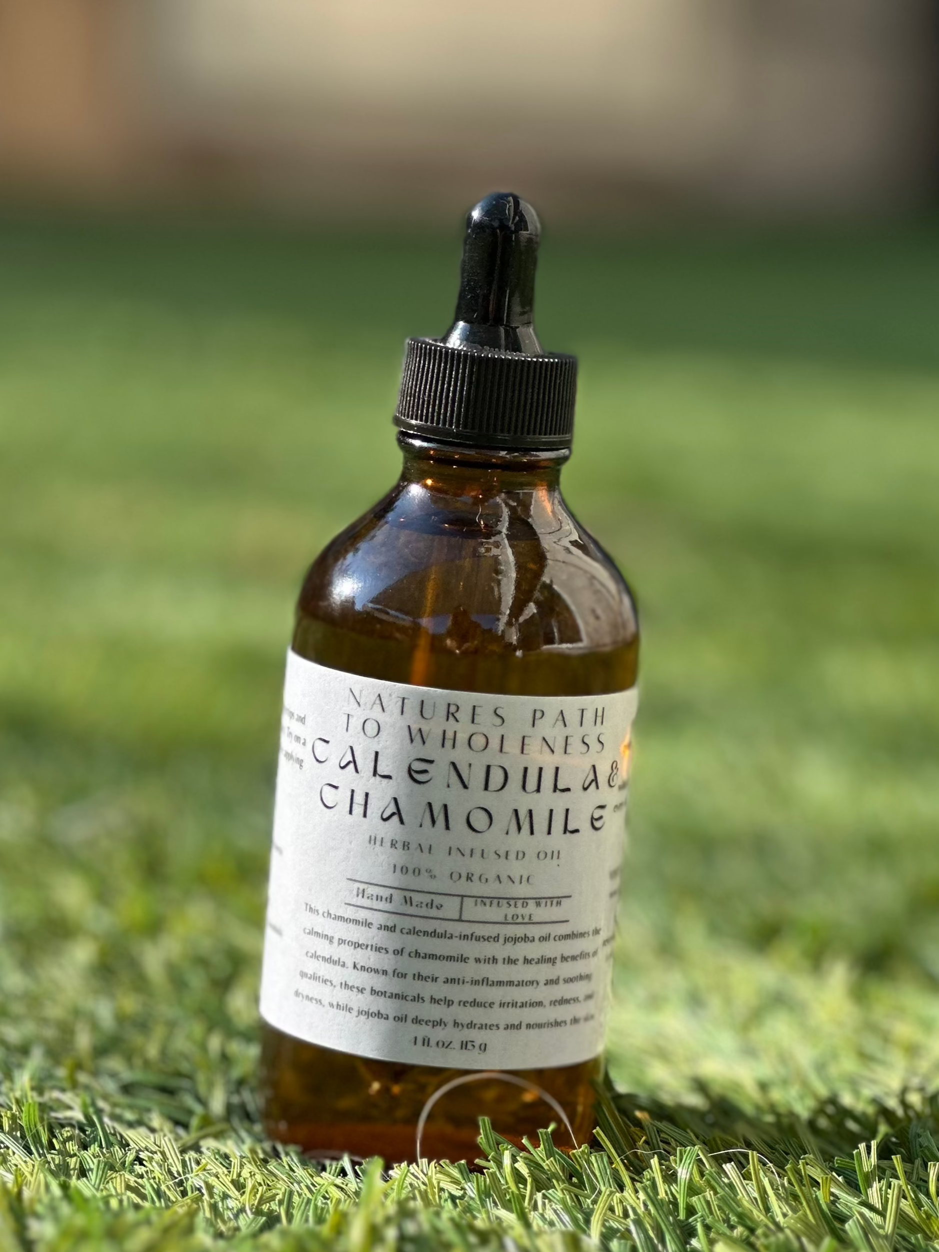 Calendula and chamomile herbal infused oil 4 oz amber bottle